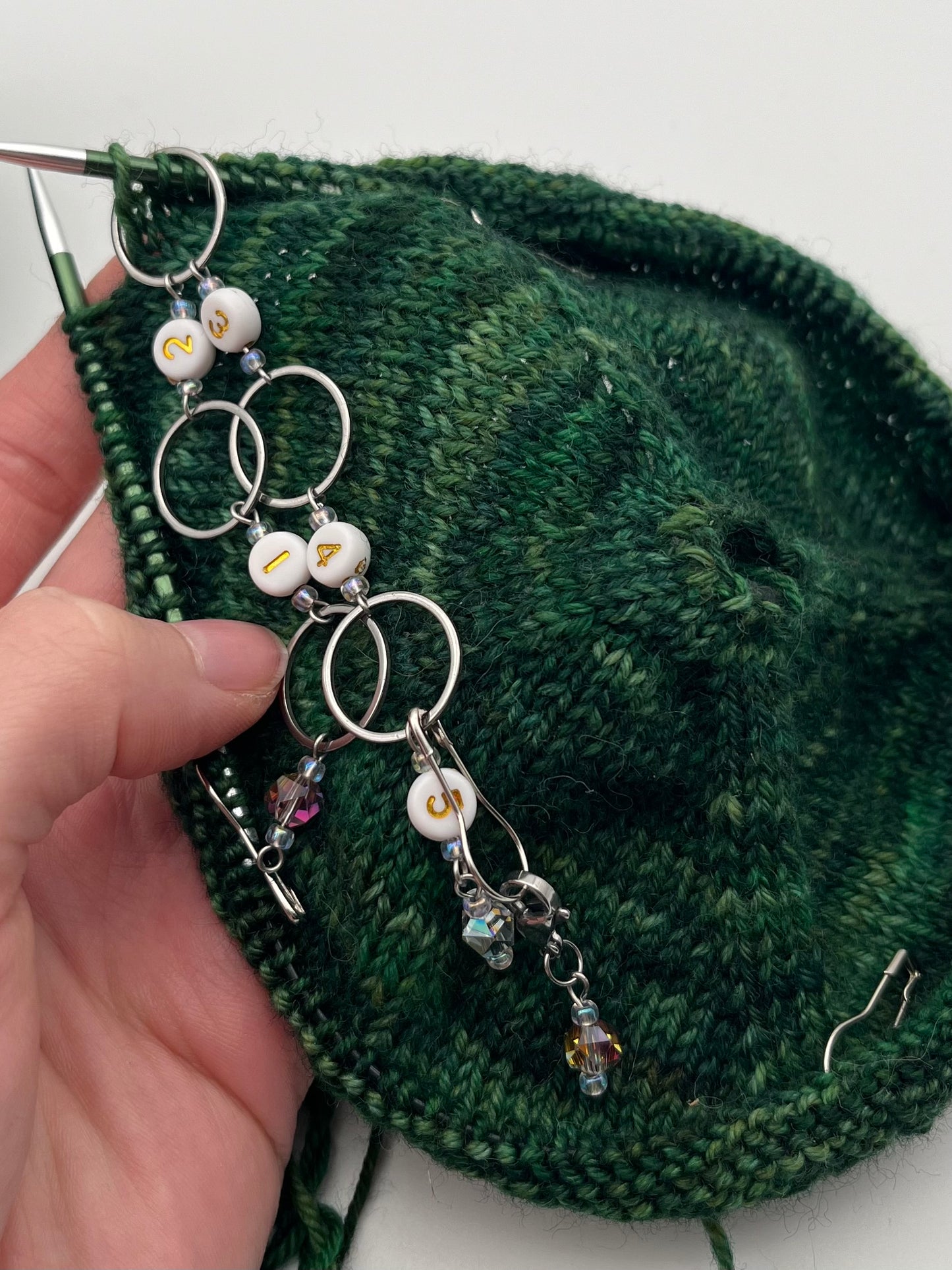 Reihenzähler 1-5 Facettperle mit großem Ring Silber