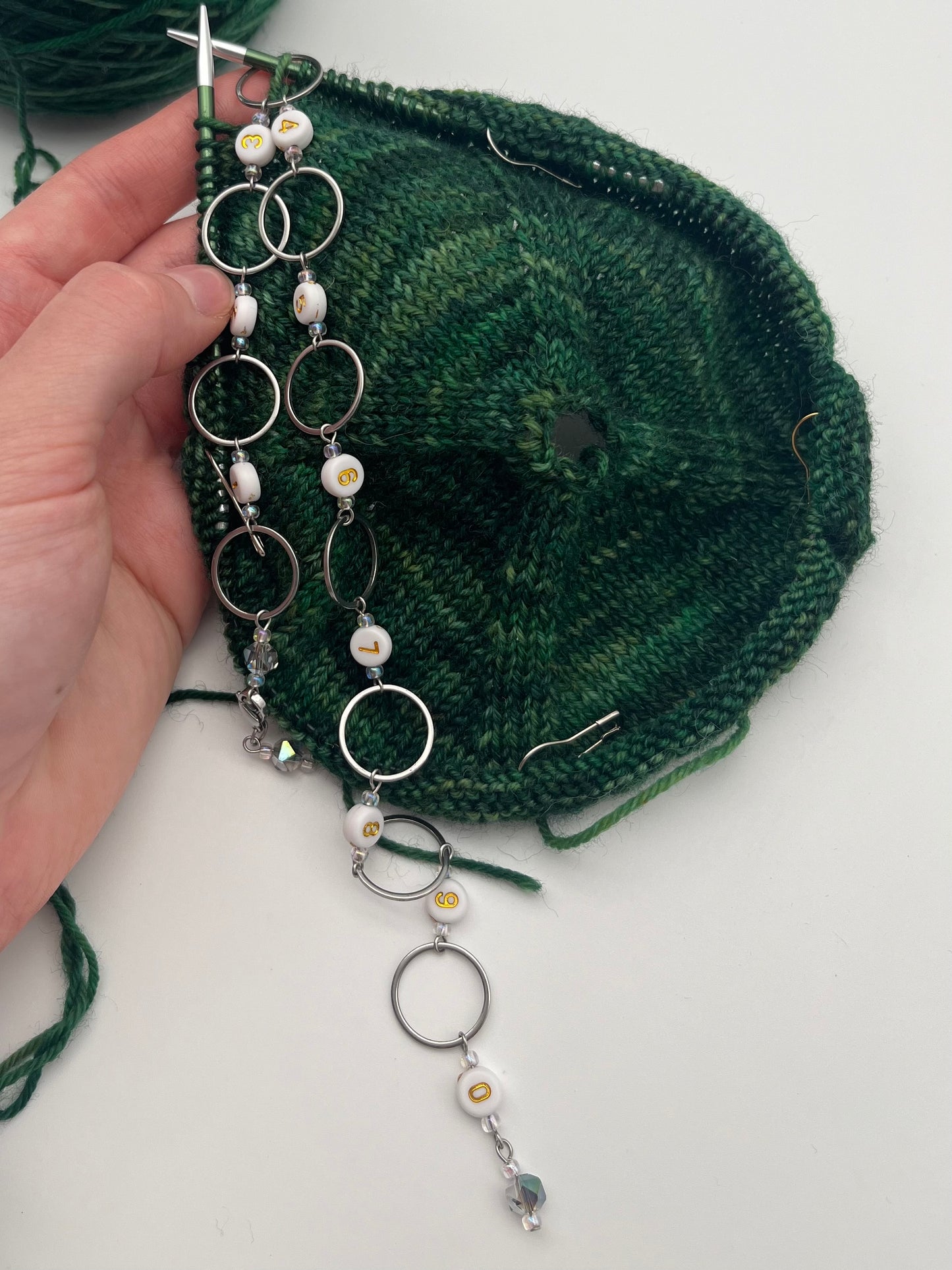 Reihenzähler 1-10 Facettperle mit großem Ring Silber