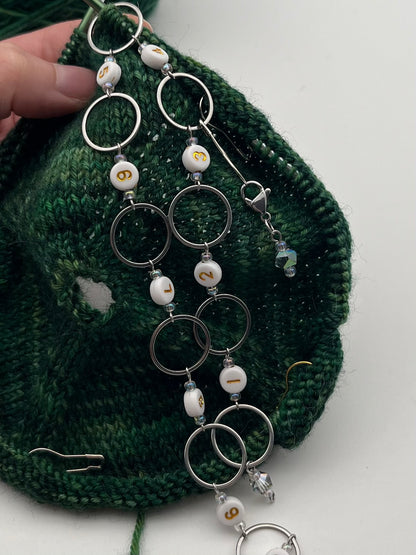 Reihenzähler 1-10 Facettperle mit großem Ring Silber