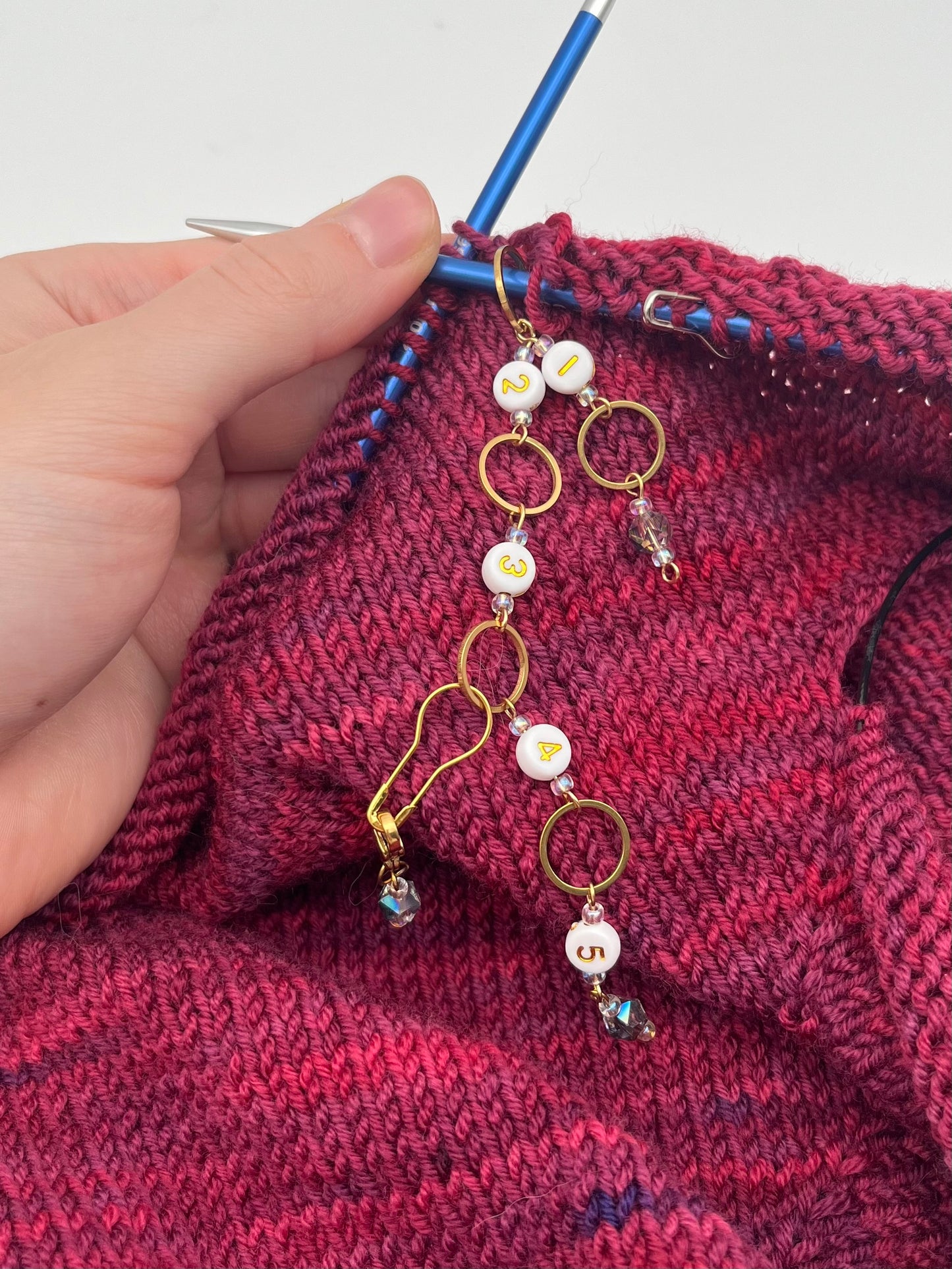 Reihenzähler 1-5 Facettperle mit kleinem Ring Gold