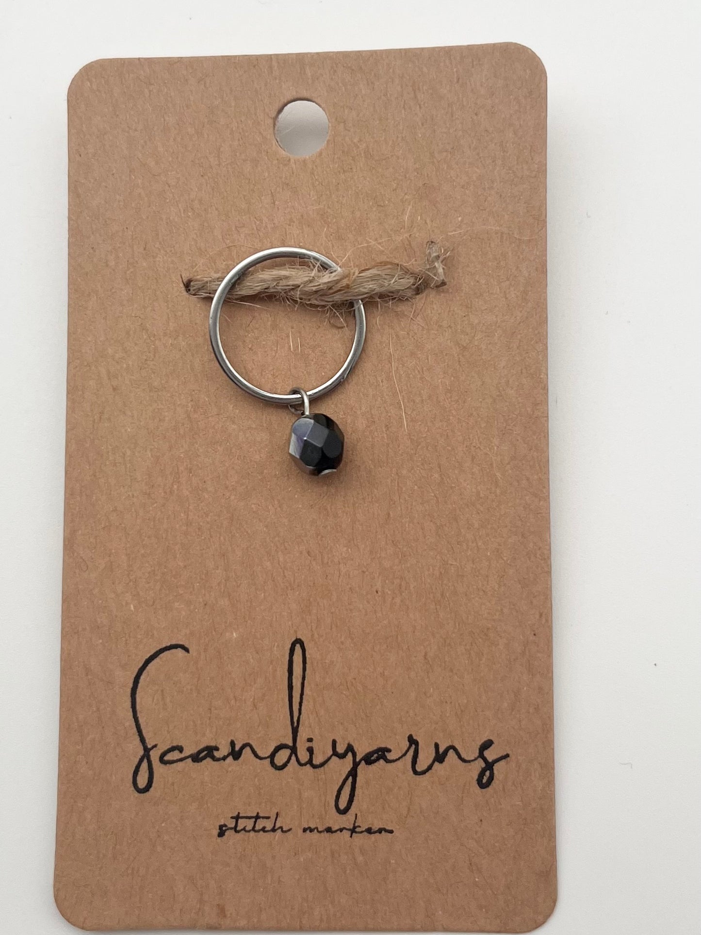 Rondellperle Schwarz mit großem Ring Silber