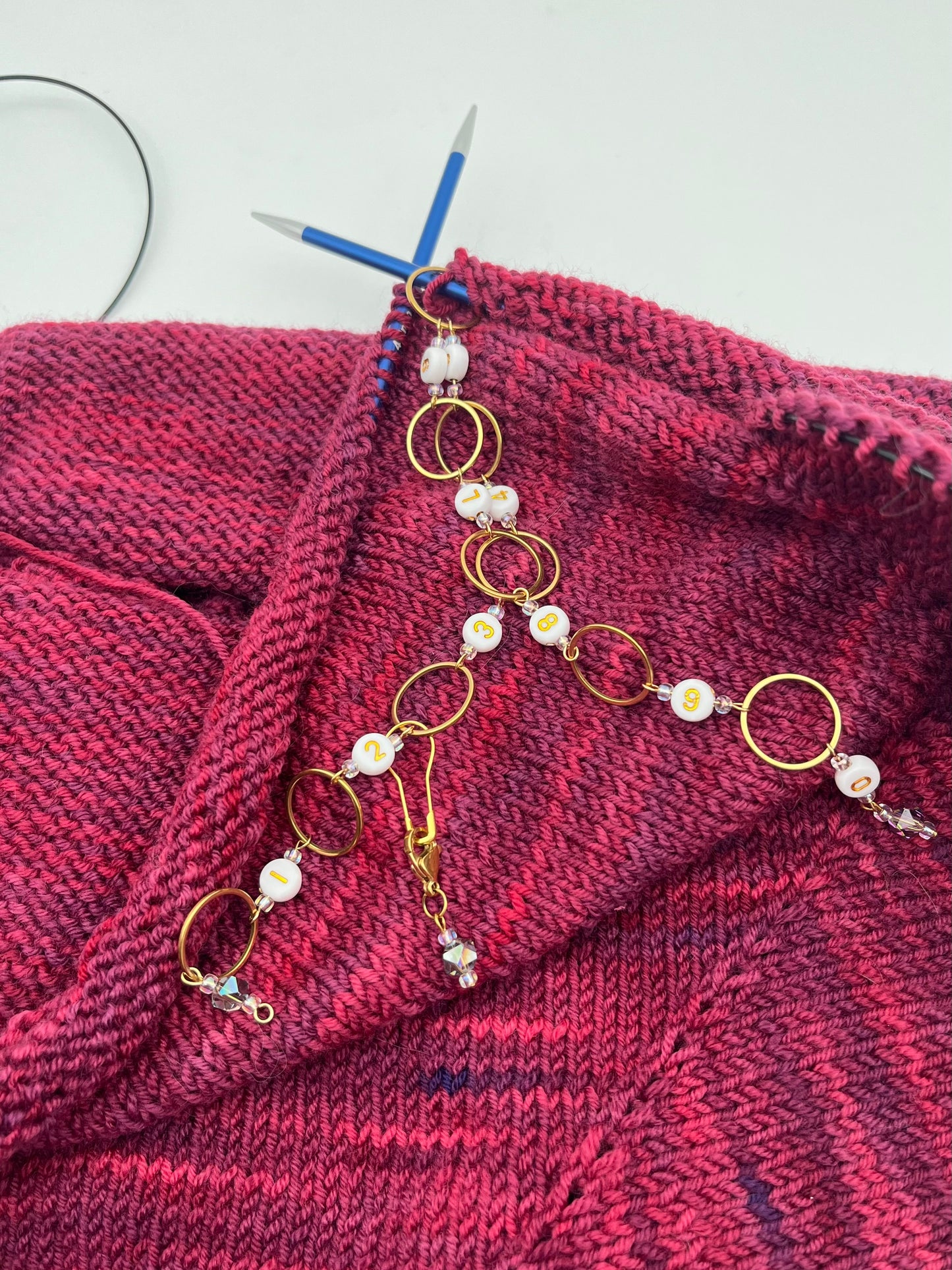 Reihenzähler 1-10 Facettperle mit großem Ring Gold