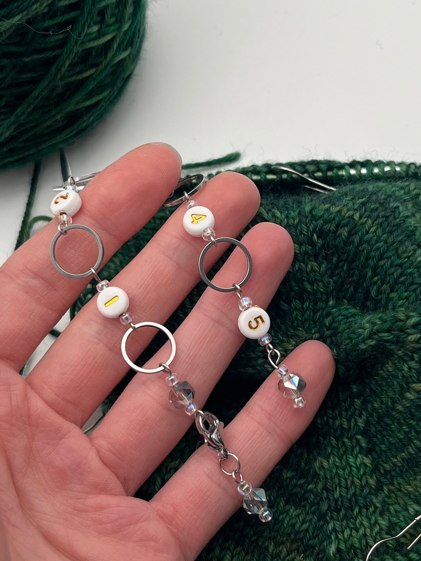 Reihenzähler 1-5 Facettperle mit kleinem Ring Silber