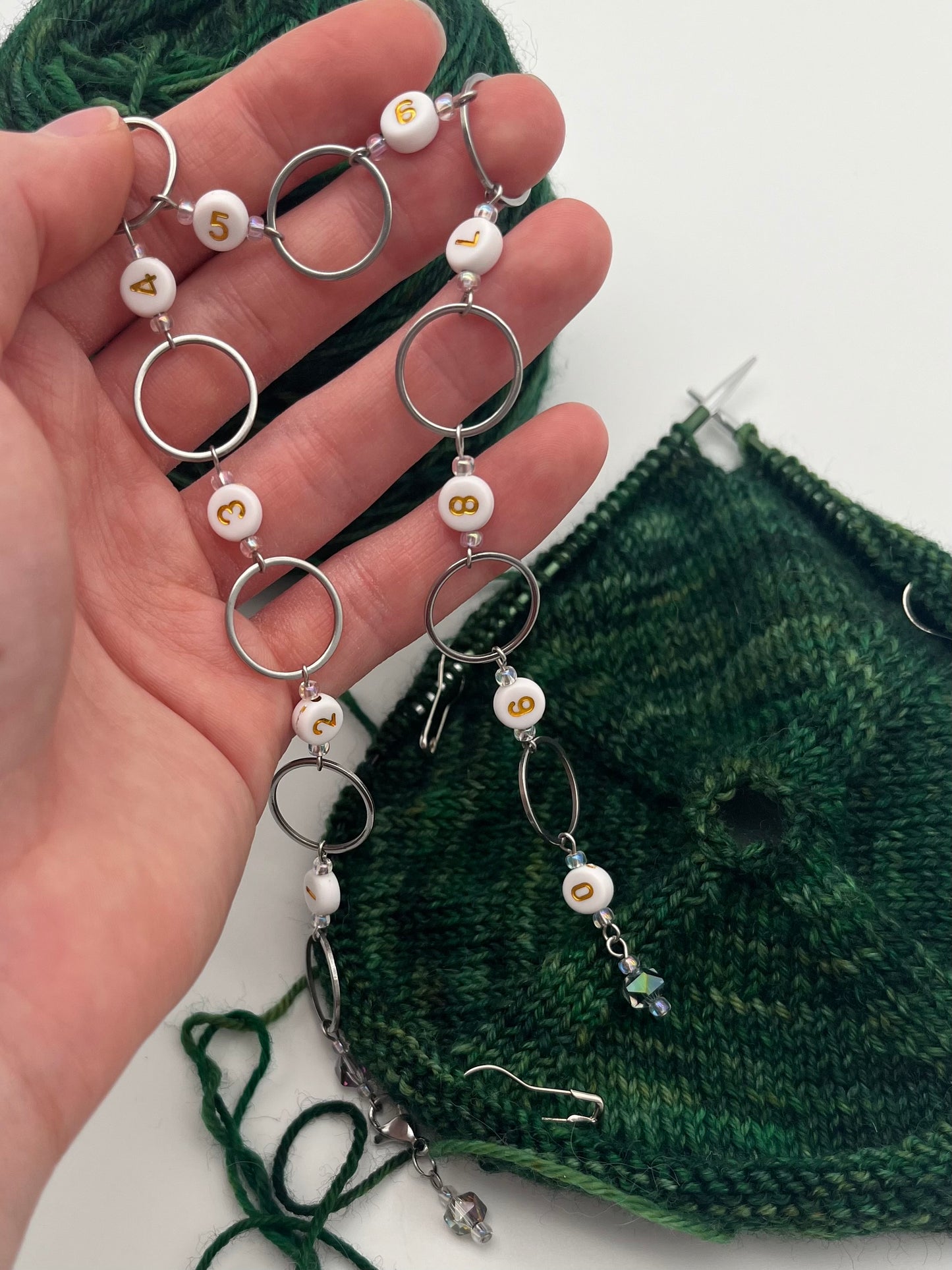 Reihenzähler 1-10 Facettperle mit großem Ring Silber