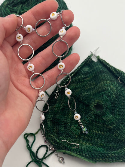 Reihenzähler 1-10 Facettperle mit großem Ring Silber