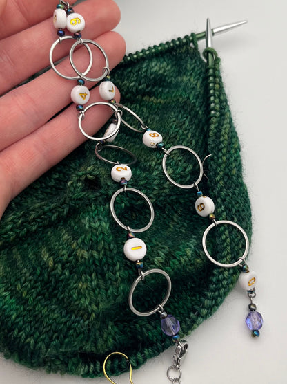 Reihenzähler 1-10 Rondellperle mit großem Ring Silber