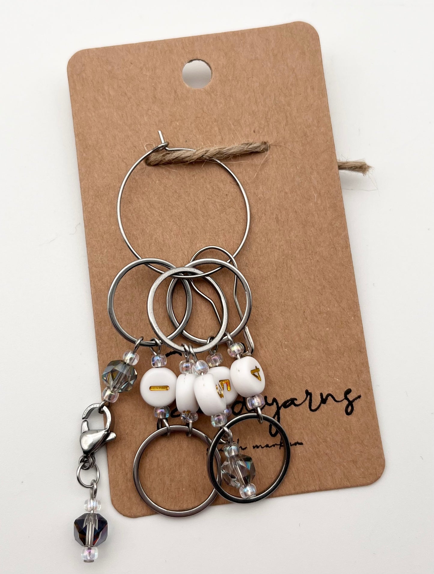 Reihenzähler 1-5 Facettperle mit großem Ring Silber