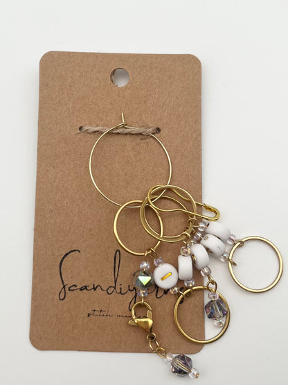 Reihenzähler 1-5 Facettperle mit großem Ring Gold